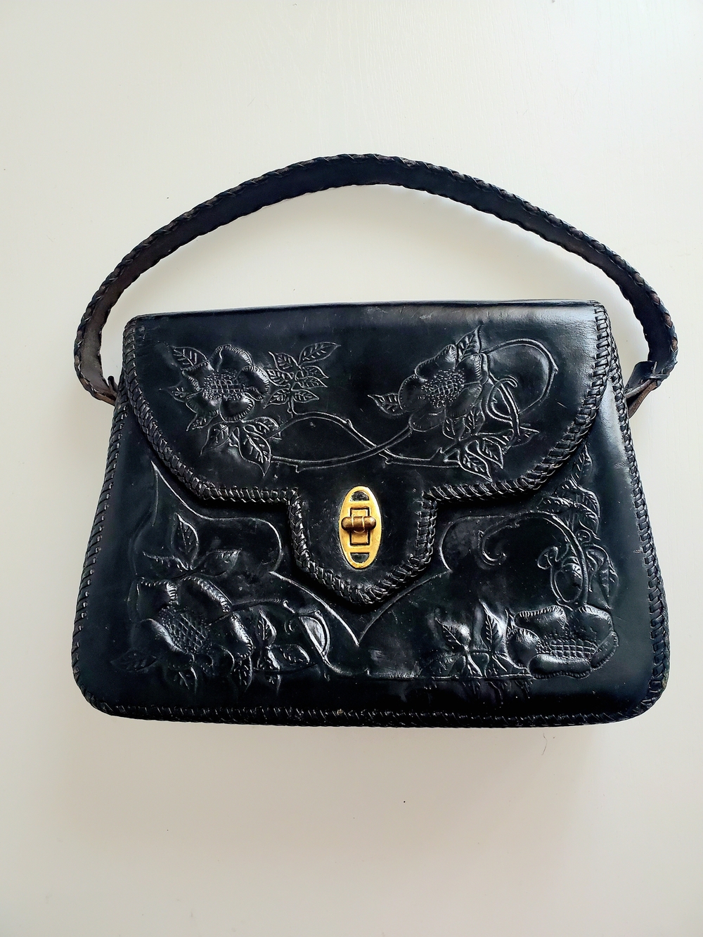 Stunning 1960 Hand-Tooled Black Leather Handbag with Gold-Tone Turn Lock -